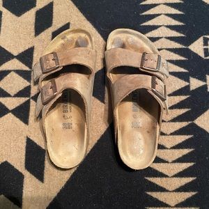 Birkenstock Arizona oiled leather sandals.